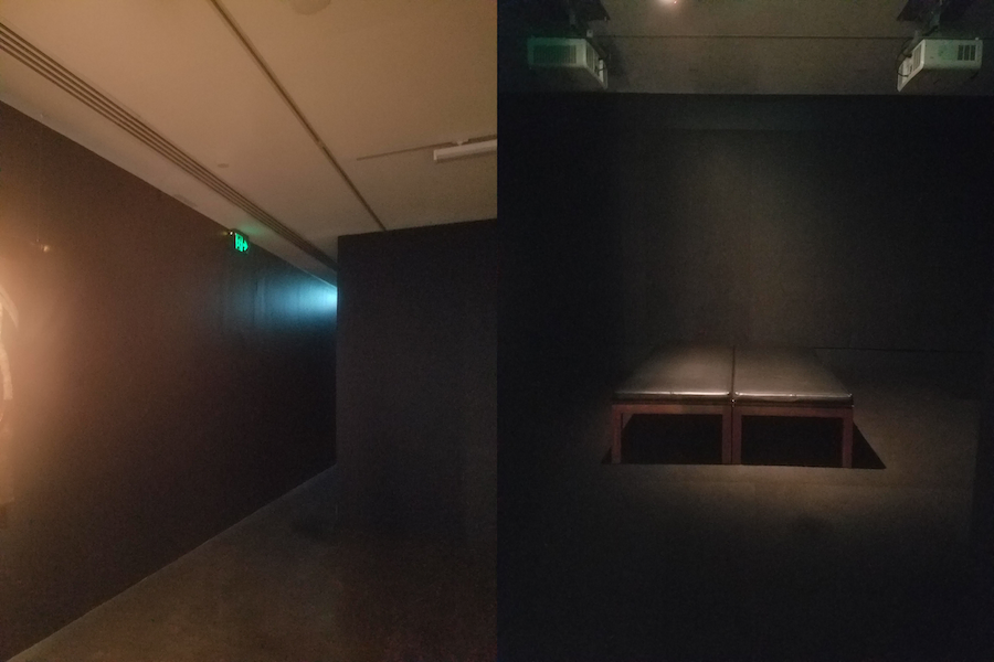 Two photos of a dark gallery room with a bench in it.